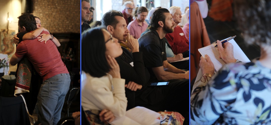 Participants embracing, listening intently, and taking notes at The Crossing